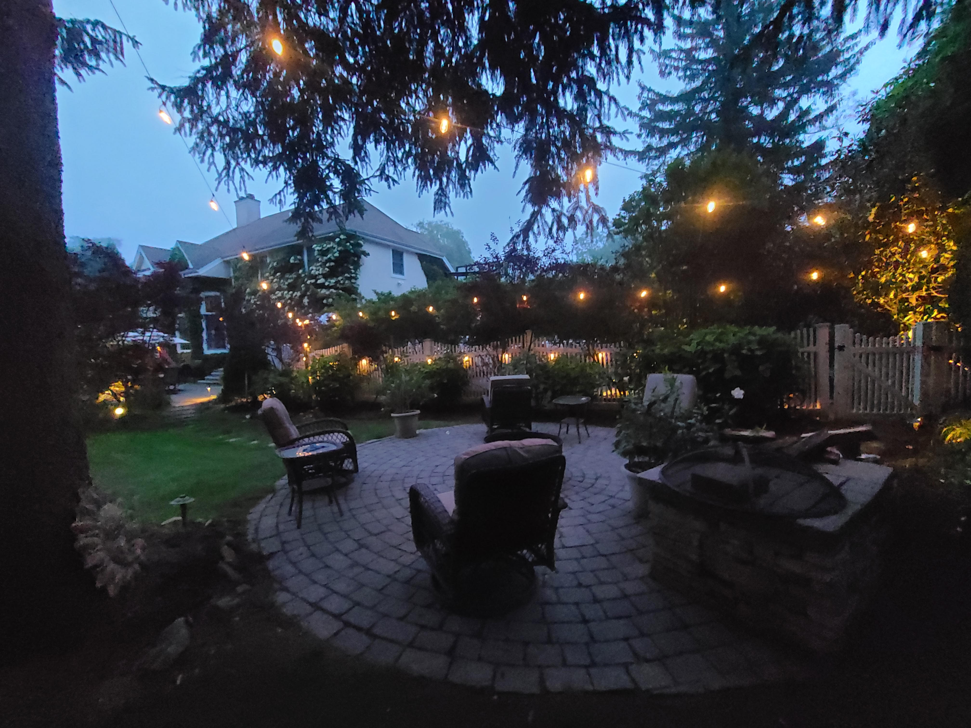 After bistro lighting installation in Huntington backyard
